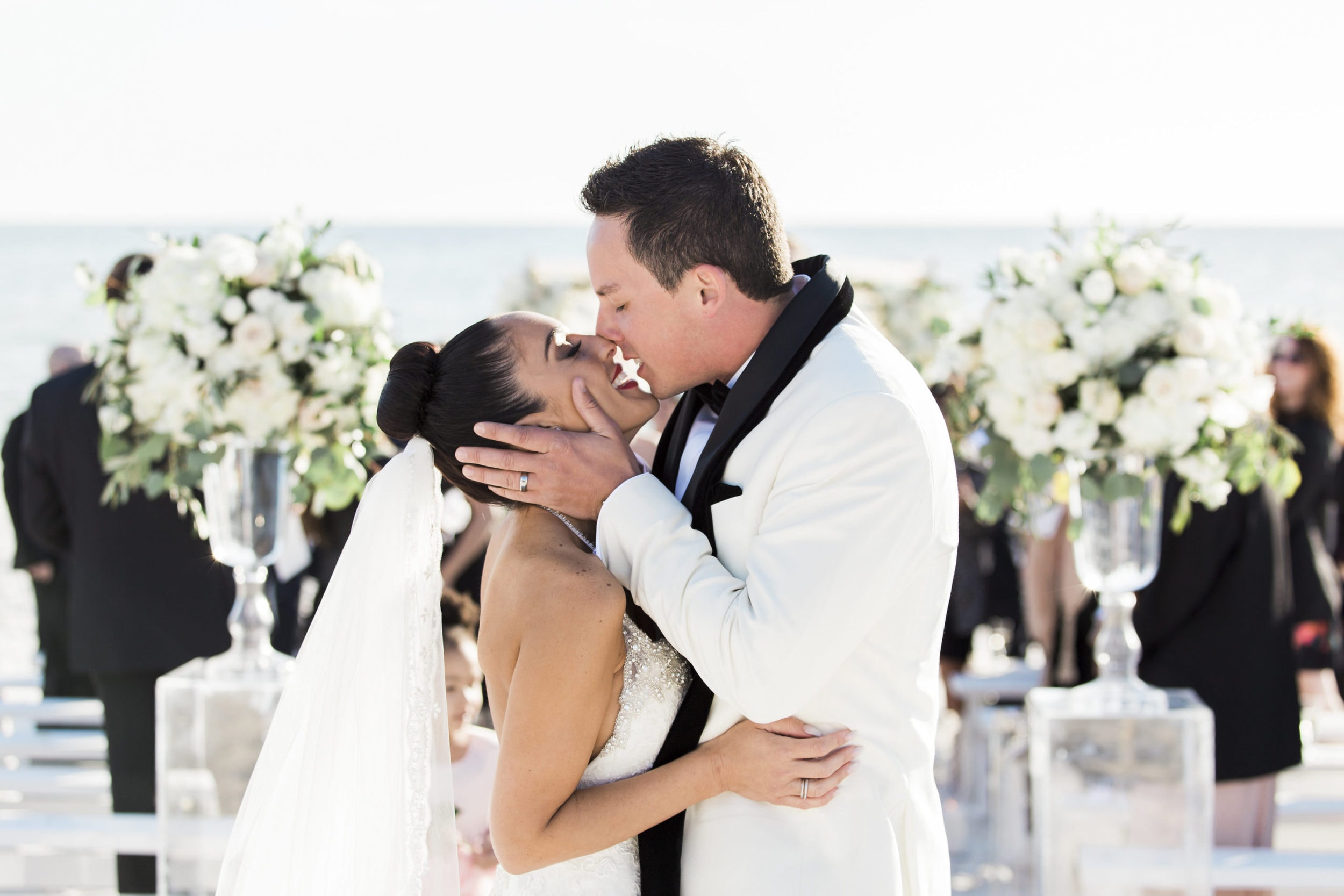 bride and groom first kiss during ceremony on rosemary beach