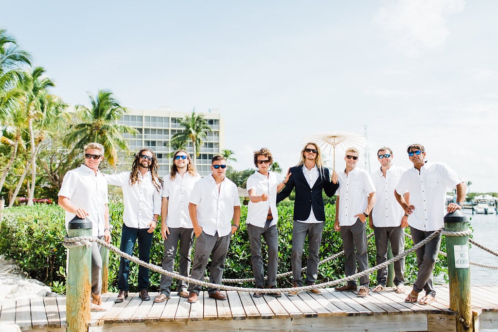 groomsmen photos at coconut palm inn tropical florida keys wedding