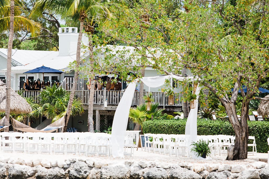panoramic view of beachfront ceremony location at coconut palm inn from dock
