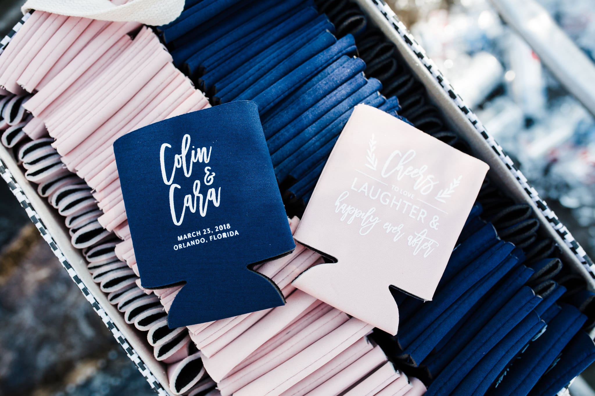 reception coozies for guests in pink and blue