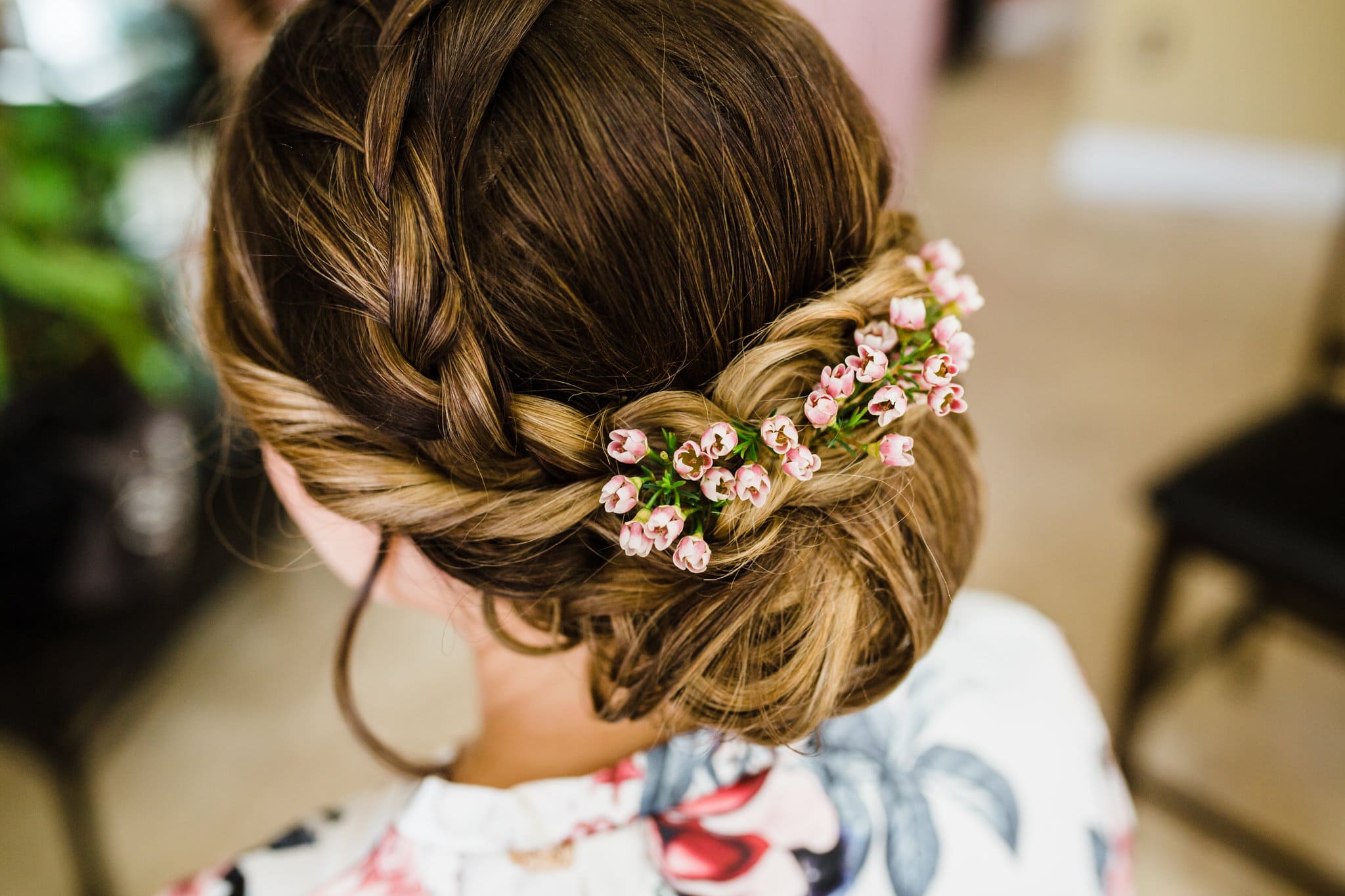 bridal braid updo with real flowers