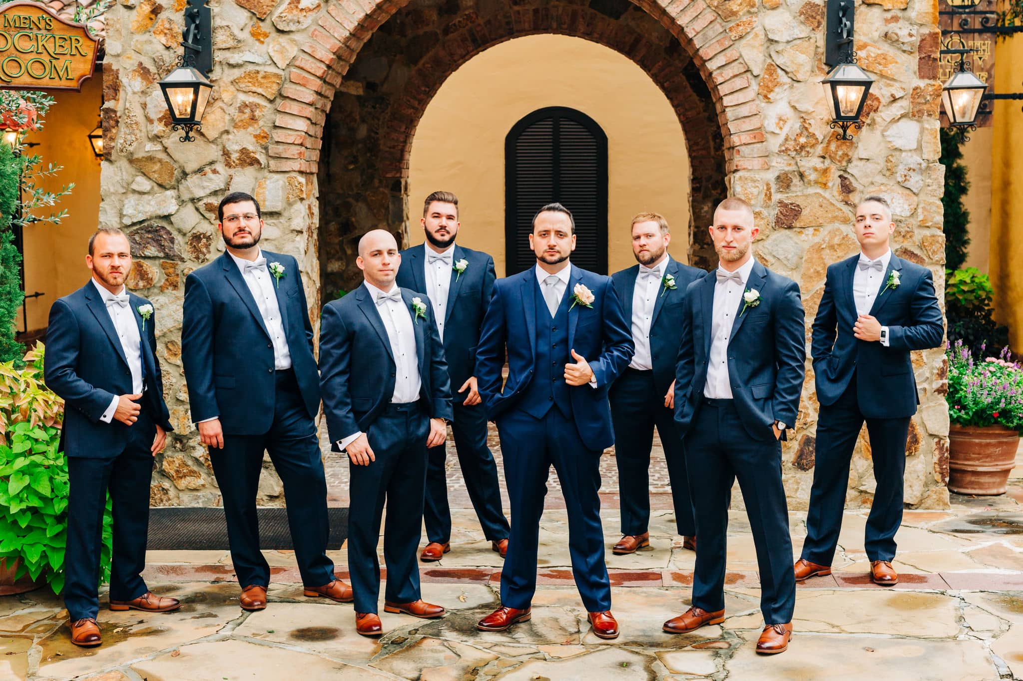 groomsman picture at bell tower Bella collina