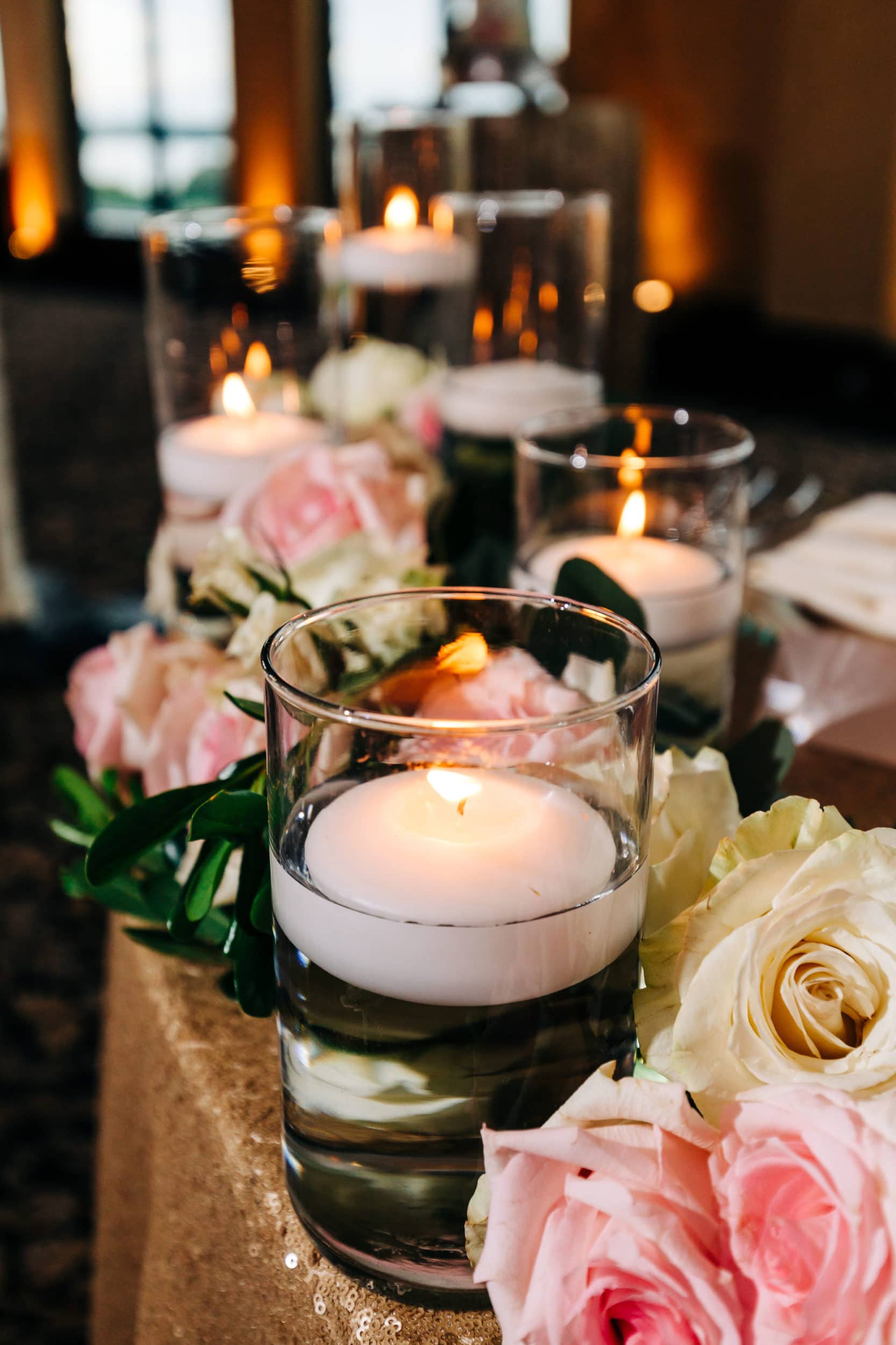 floating candles reception centerpieces with pink and white flowers